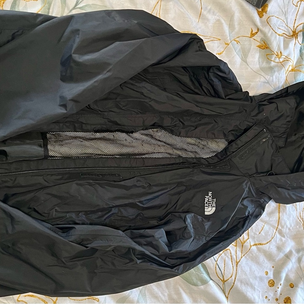 The North Face Black Hooded Rain Jacket women’s small.